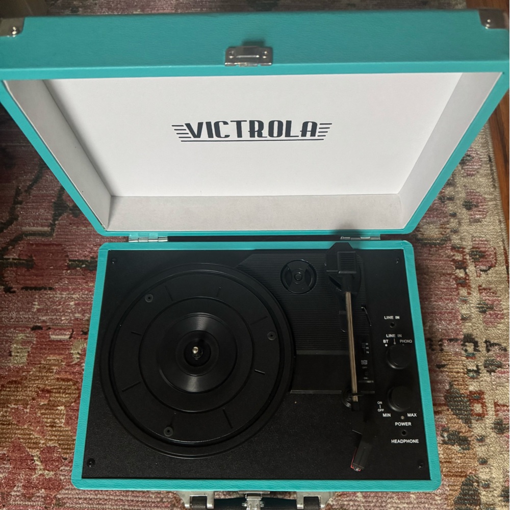 Victrola turquoise suitcase record player